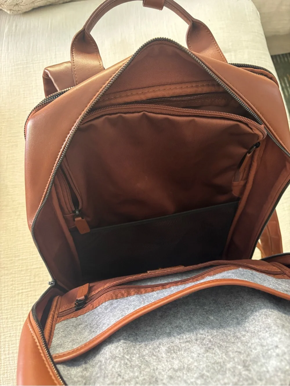 Monos Metro Backpack for Travel in Mahogany Vegan Leather